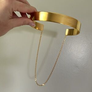 Gold choker cuff necklace with attached chain